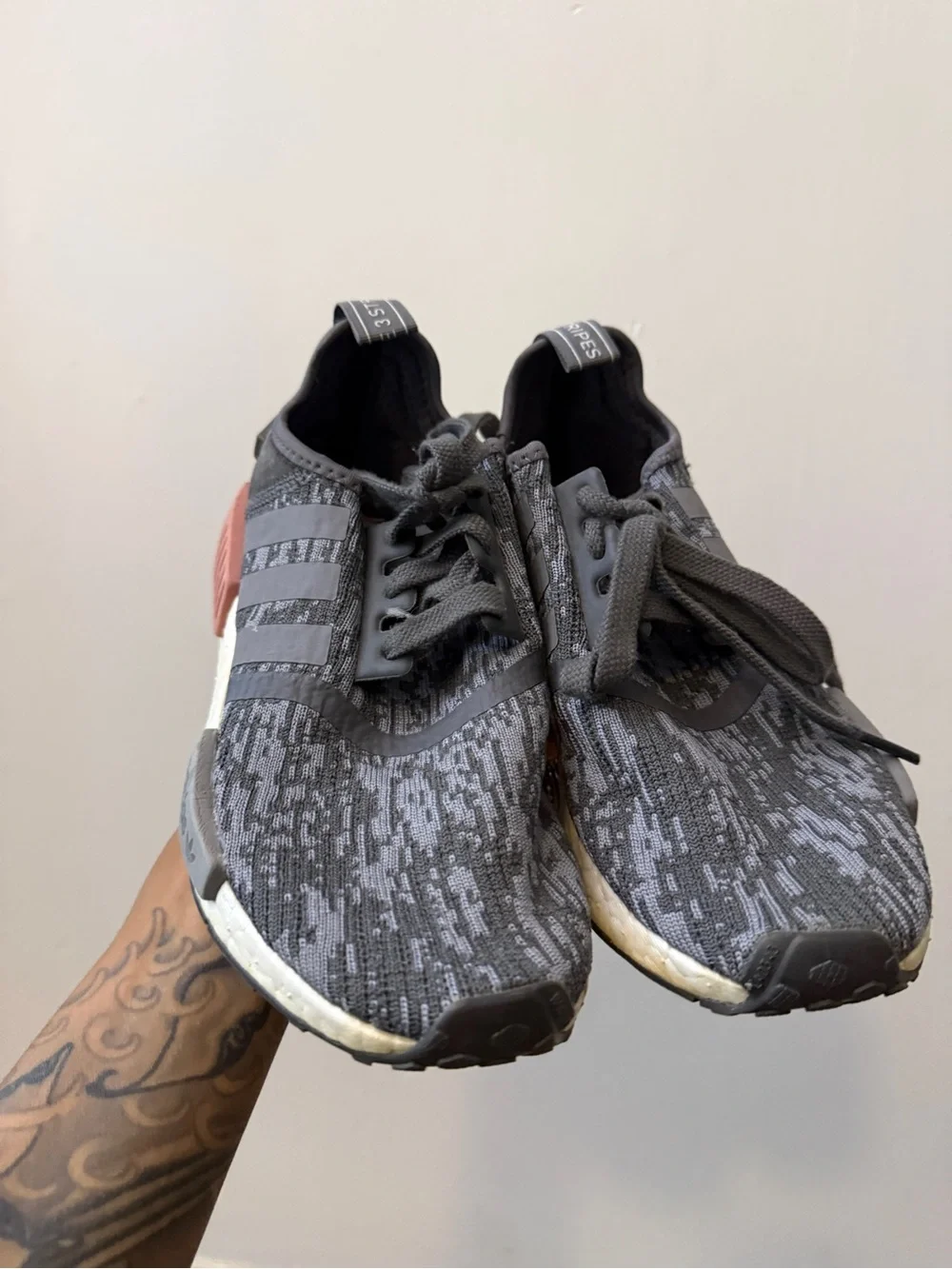 adidas Women’s Black/Grey Knit NMD_R1 Sneakers with Rose Accent